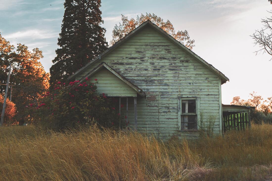 A dilapidated house representing homebuying myths