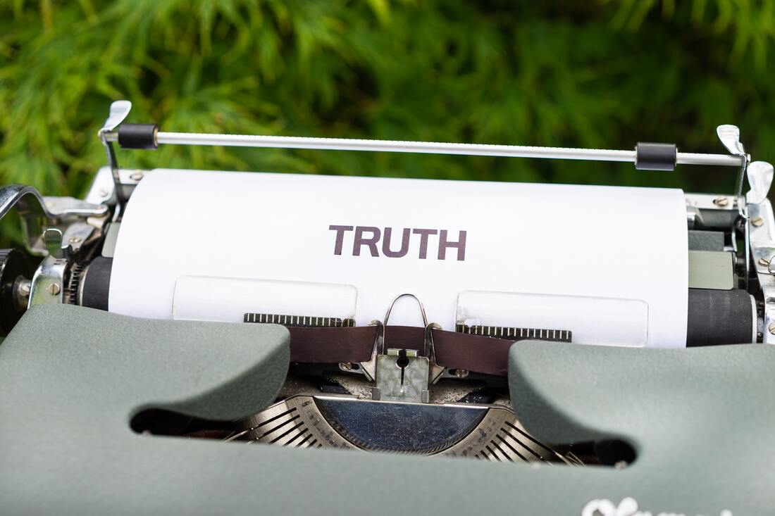 The word Truth typed out on a piece of paper inserted in a typewriter. How to make your home listing stand out? Be honest!