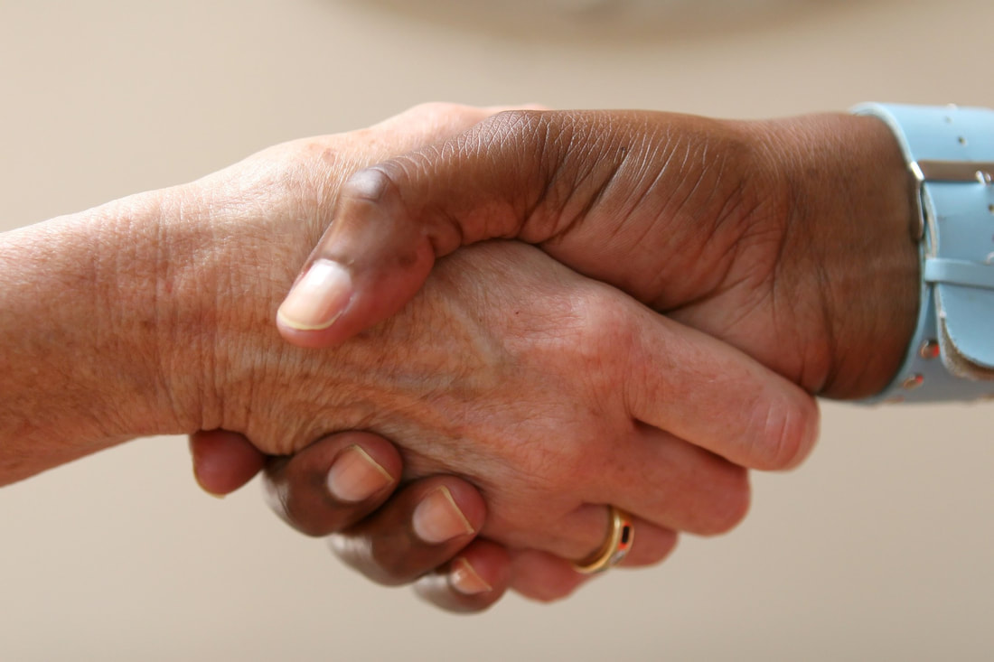 Shaking hands on a home sale